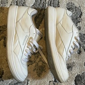 Men’s white Reebok sneakers